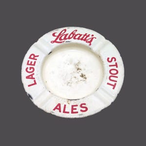 Antique Labatts Stout Lager ale tin litho ashtray. Red Labatt's cursive logo.