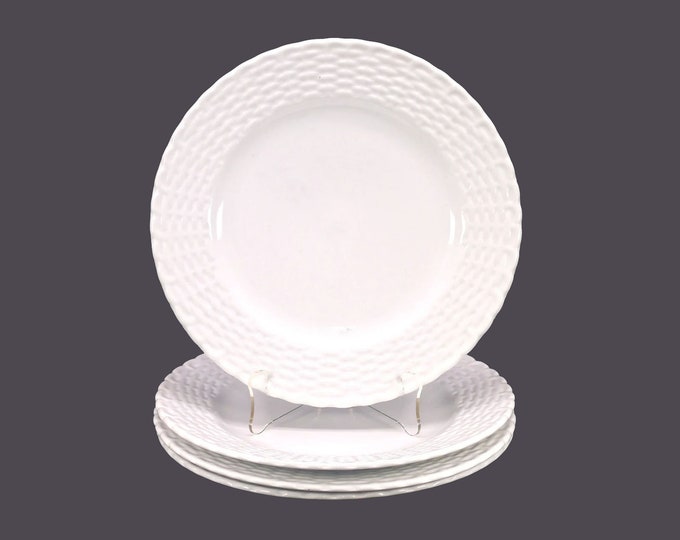 Four Tienshan White Wicker Chef's favorite all-white large dinner plates.