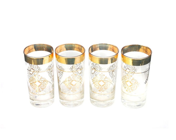 Four atomic-age tumbler | hi-ball glasses. Gold medallion and bands. Attributed Culver.