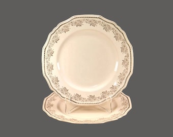 Pair of Alfred Meakin Golden Astoria dinner plates made in England. Flaw (see below).