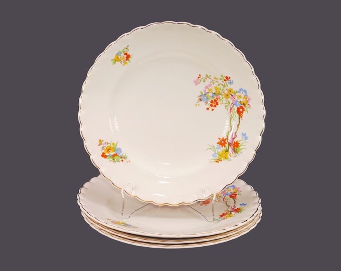 Four antique Edwardian Age J&G Meakin MEK188 dinner plates made in England.