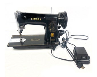 Mid-century Singer Sewing Machine 191J. Working condition.