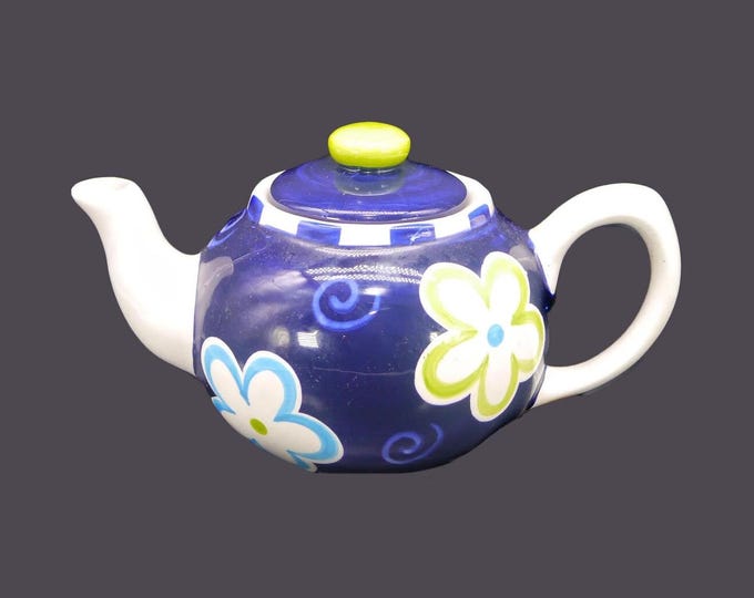 Stoneage Handpaint | Living Art four-cup teapot. Blue, green flowers, green-topped lid. Carleen Gaby Australia. Flaws (see below).