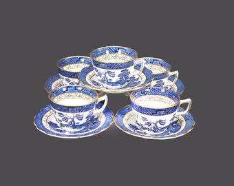 Five Booth's Real Old Willow A8025 cup and saucer sets. Classic blue-and-white Chinoiserie made in England.