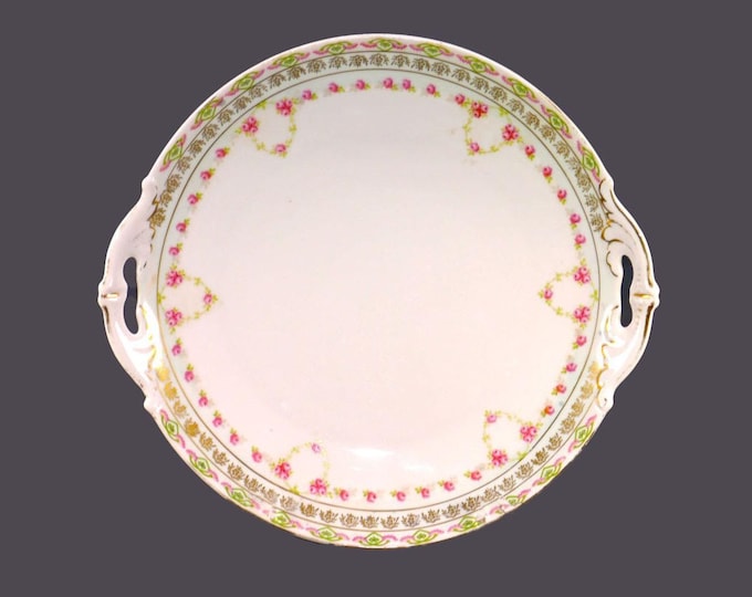 Antique MZ Austria | Altrohlau 1003 lugged cake serving plate. Pink rose swags.