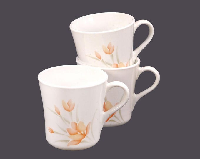 Three Corning Pyrex Peach Floral orphan cups only made in USA.