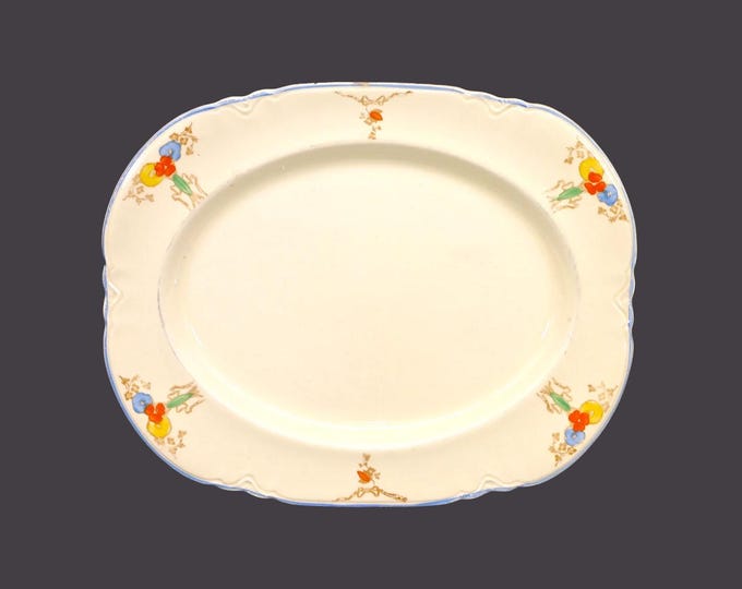 Art-deco era Wood & Sons sandwich platter. Red, blue and yellow bell flowers, blue trim. Woods Ivory Ware made in England.