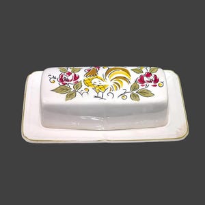 Mikasa Heritage covered stoneware butter dish. Rooster, florals made in Japan. Flaw.
