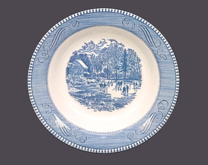 Royal China Currier & Ives Blue Early Winter rimmed soup bowl made in USA. Sold individually.