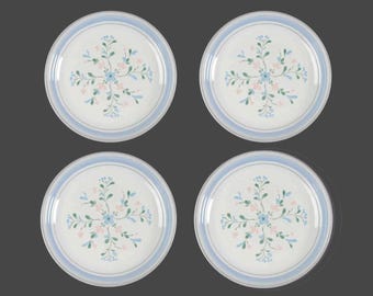 Four Yamaka Fascino stoneware salad plates made in Japan.