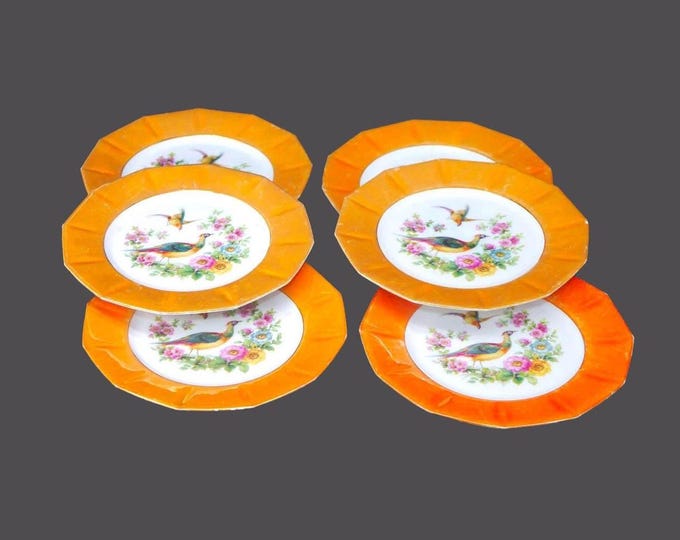 Six antique orange lusterware dessert plates. Peacocks and florals. Made in Germany. Flaws (see below).