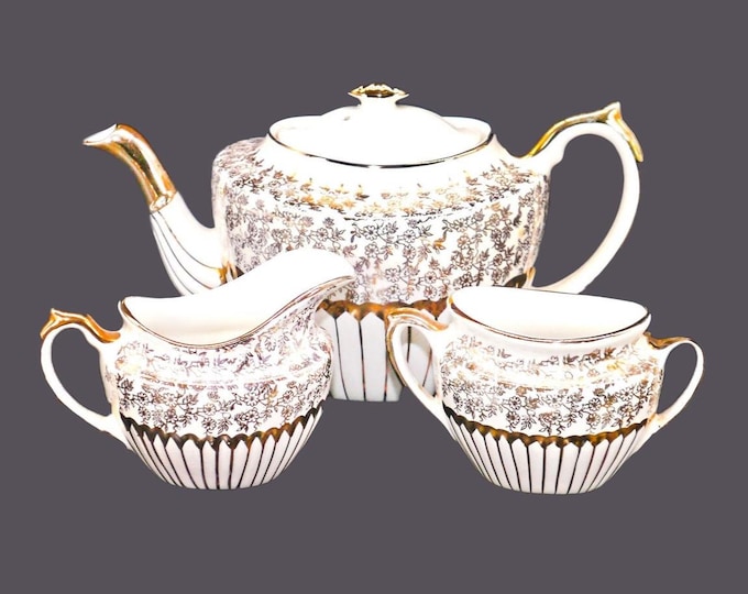 Vintage Gibsons England W802 gold floral chintz teapot, creamer, sugar bowl.