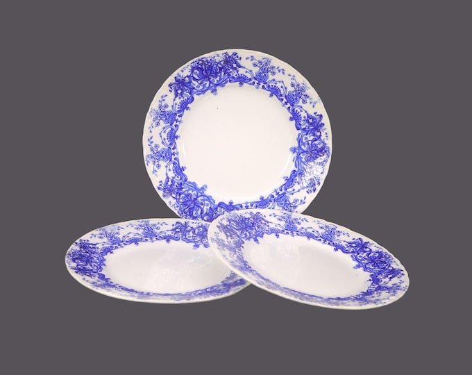 Three antique Edwardian Age Dudson, Wilcox & Till Corona Blue flow-blue dinner plates made in England.