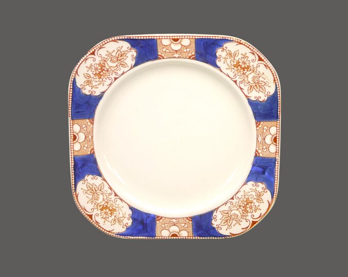 Art-deco era square imari salad plate in the style of Wood and Sons Napoli. Cobalt panels, brown flowers. Stamped V1933. Sold individually.