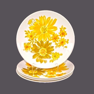 Four retro Crown Lynn Topaz flower power salad plates made in New Zealand.
