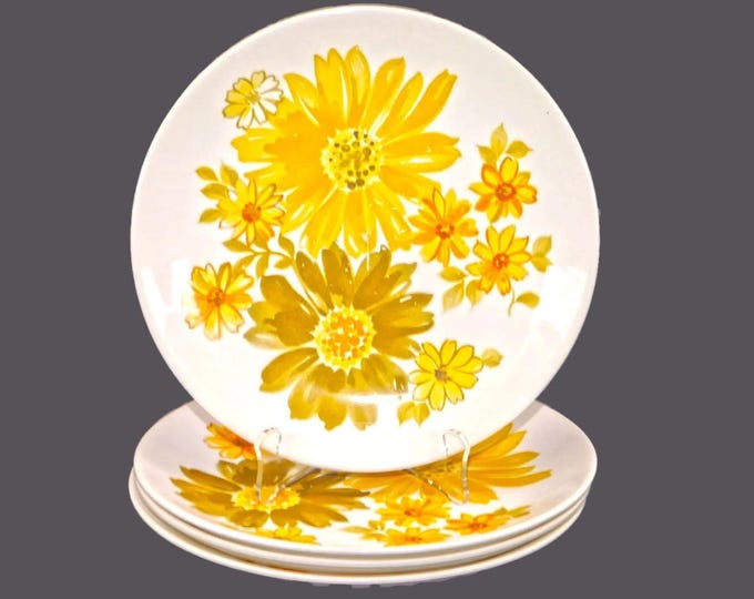 Four retro Crown Lynn Topaz flower power salad plates made in New Zealand.