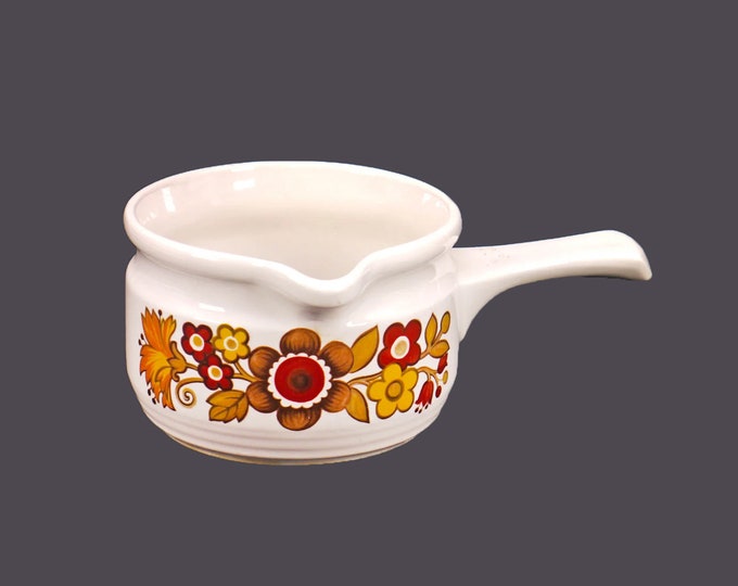Myott Festival gravy boat with stick handle made in England. Flaw (see below).