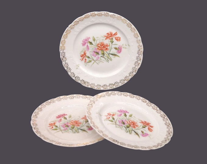 Three antique art-nouveau period Krister Porzellan bread, dessert plates made in Germany. Flaw (see below).