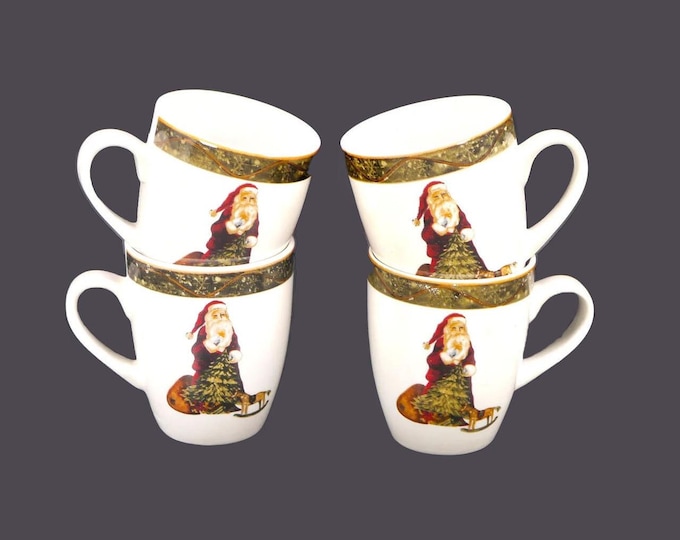 Four Christmas Santa coffee or tea mugs. Santa Claus with sack, rocking horse, tree and green confetti band.