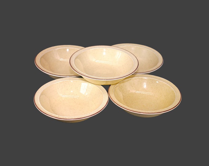 Five Poole Pottery Parkstone rimmed stoneware fruit nappies, dessert bowls made in England.