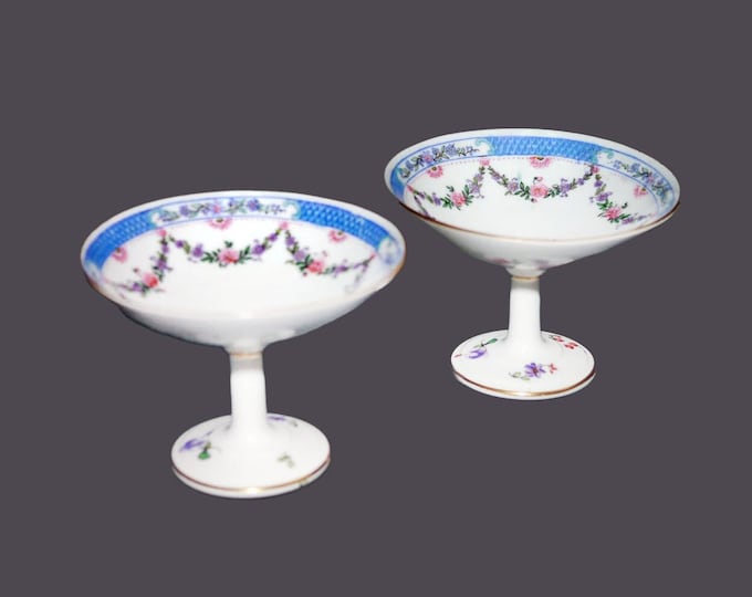 Pair of antique art nouveau George Jones 19625 hand-decorated compotes, stemmed ring or jewelry dishes made in England. Ryrie Bros Toronto.