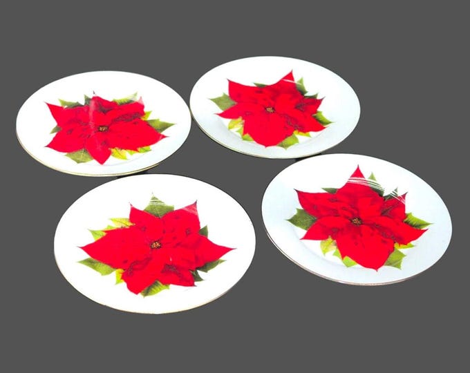 Four Isaac Mizrahi Christmas poinsettias dessert plates.