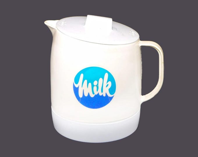 Quikut Dairy Farmers of Ontario plastic Milk jug with lid made in USA.