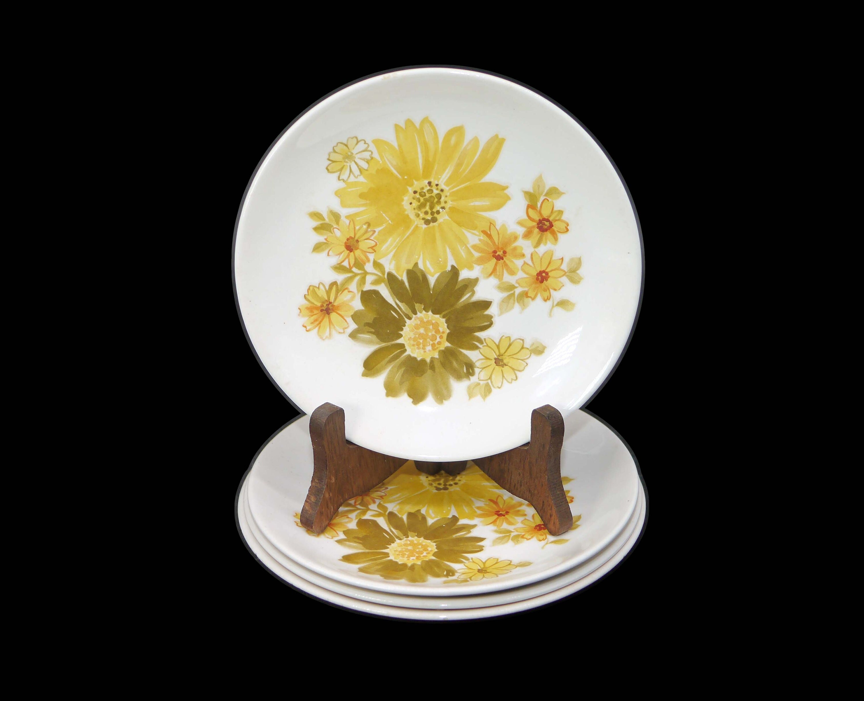 Four Crown Lynn Topaz plates made in New Zealand. Two dessert plates