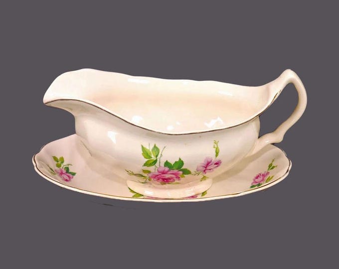 Johnson Brothers JB602 gravy boat with under-plate made in England. Flaw (see below).