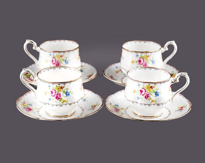 Four Royal Albert Petit Point cup and saucer sets made in England.
