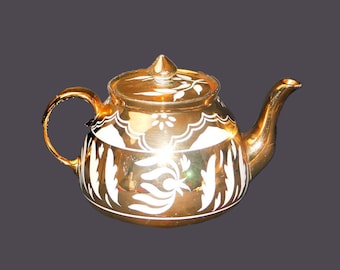 Gibsons W206 hand-decorated four-cup gold lusterware teapot with lid made in England.