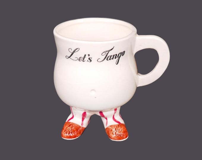 Let's Tango coffee or tea mug in the style of Walking Ware made in Japan for Giftcraft. Very minor flaw (see below).
