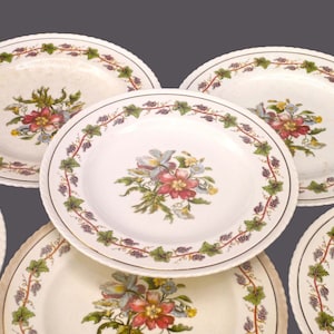 Seven antique Crown Ducal Riviera salad plates made in England. Flaws (see below).