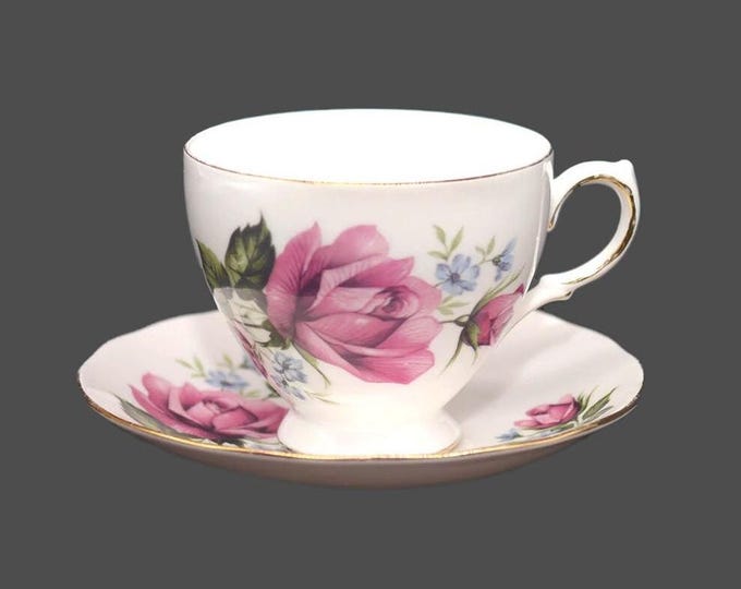 Royal Vale 8330 bone china cup and saucer set made in England. Pink roses, bluebells, gold edge and accents.