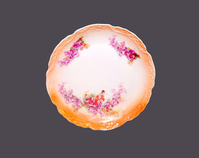 German lusterware round serving platter. Roses, orange luster, embossed details. Flaw (see below).