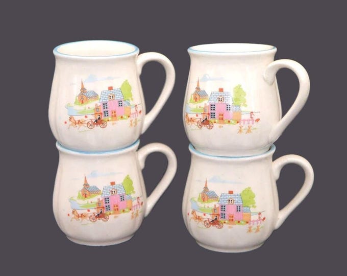 Four JAP260 stoneware coffee or tea mugs made in Korea. Pink house, bicycle, blue trim.