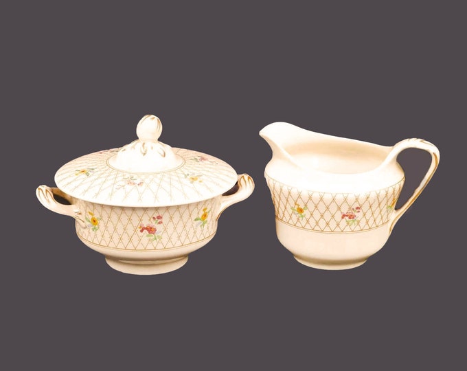 Antique Edwardian Age Johnson Brothers Old English Trellis creamer and covered sugar bowl.