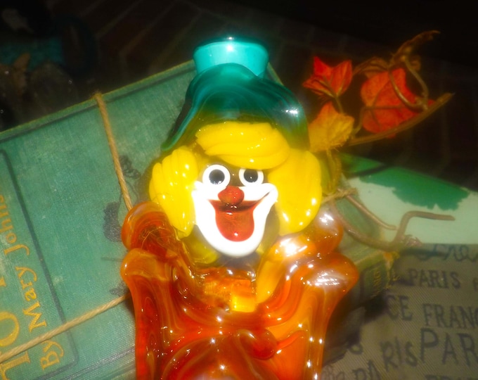 Mid-century  Murano art-glass hand-blown clown figurine.  Grafitti colors, red and orange glass bow.