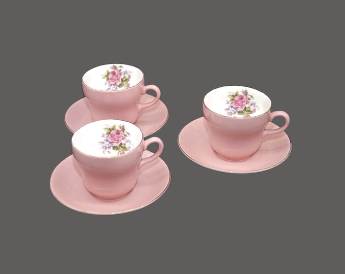Three antique Edwardian Age Royal Art Pottery tea sets. Pink with roses, blue florals, greenery gold trim.