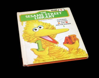 Sesame Street Library Volume 1 Muppets Teach the Letters A & B and number 1. Hardcover. Printed in USA.