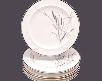 Vintage Easterling Kora bread, dessert plates made in Germany. Silver wheat.