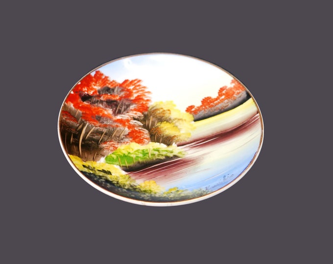 Hand-painted Nippon plate. Japanese landscape, gold edge. Signed by the artist Kuriki.