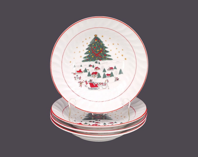 Four Royal Heritage Christmas Pleasure | Christmas Village coupe soup bowls with red trim.