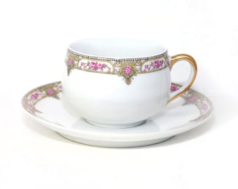 Antique Charles Ahrenfeldt Depose Limoges Classic hand-painted cup and saucer set.