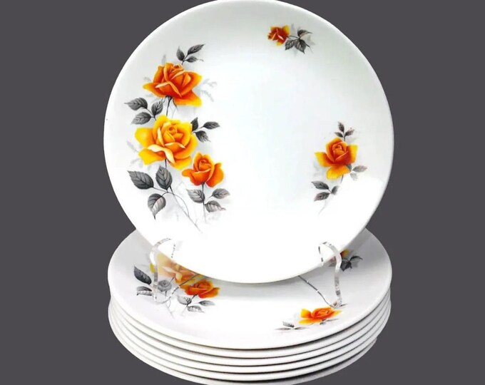 Seven Ridgway Rose d'Or bread plates made in England.