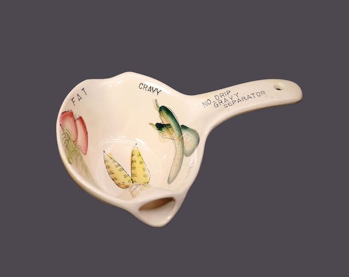 Mid century fat and lean gravy separator. Stick handle, vegetable imagery. Made in Japan. Flawed (see below).