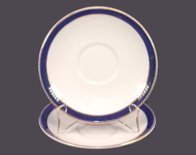 Pair of Alfred Meakin Blue de Roi orphaned saucers only made in England.