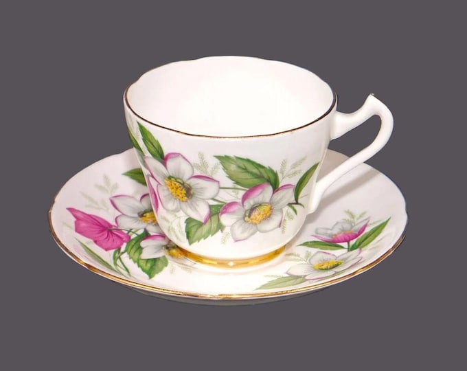 Royal Grafton bone china cup and saucer set made in England. Pink, white flowers, gold edge.