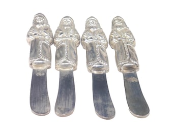 Vintage set of 4Godinger silver-plated Christmas Santa Claus butter knives or spreaders.