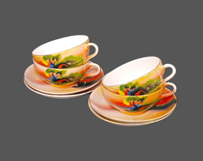 Four Chikaramachi hand-painted Nippon lusterware cup and saucer sets.